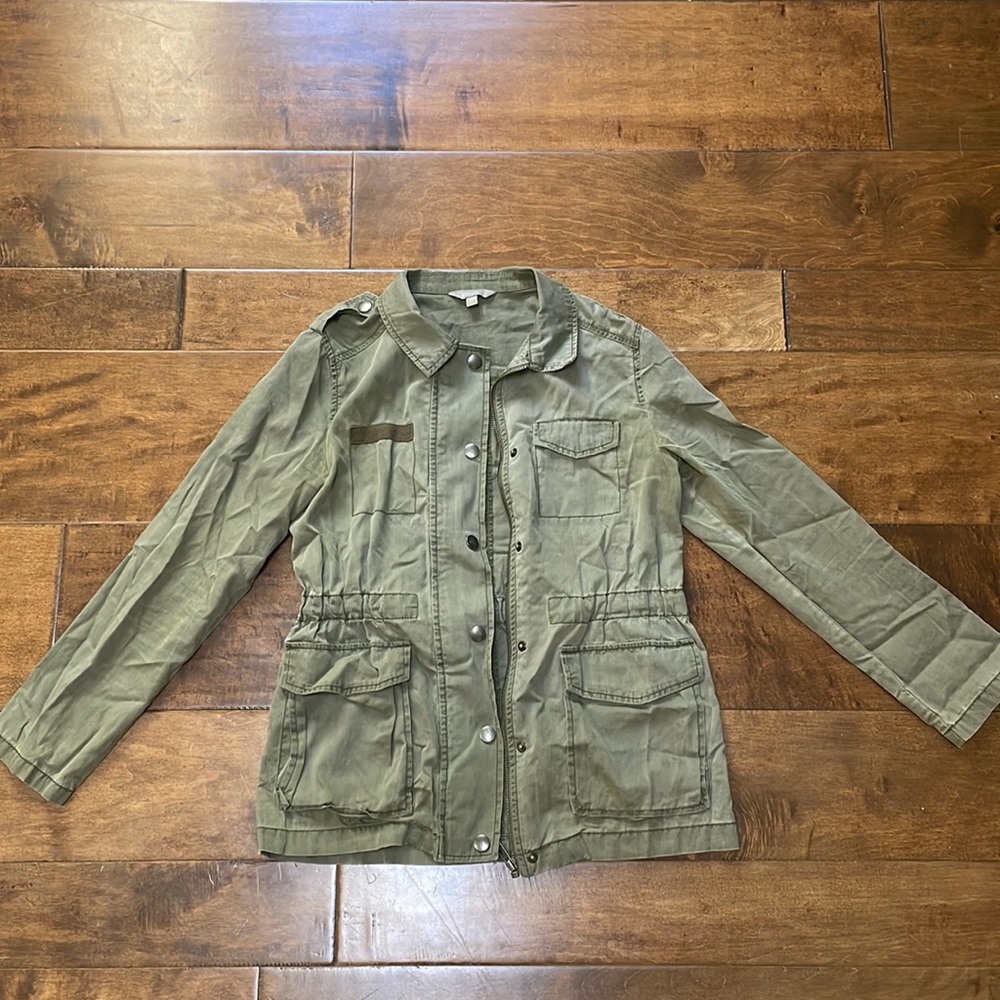 Green army jacket with pockets.